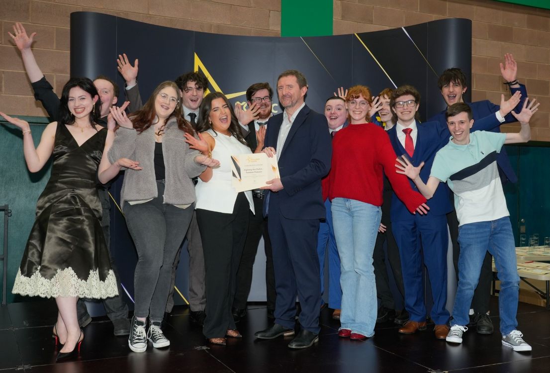 Students being presented with an Award